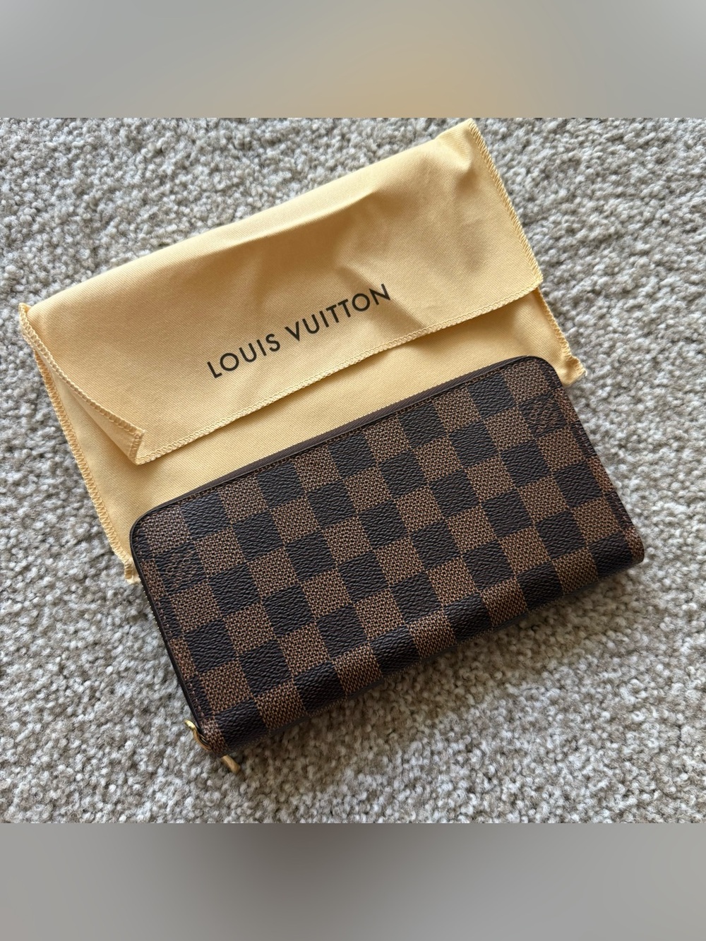 Louis Vuitton Damier Ebene coated canvas Zippy Wallet